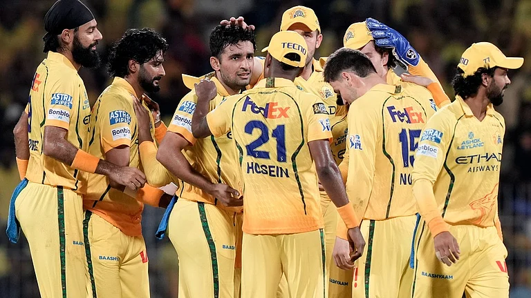Chennai Super Kings' Anshul Kamboj, centre, celebrates with teammates the wicket of Delhi Capitals' Pathum Nissanka during the Indian Premier League cricket match between Chennai Super Kings and Delhi Capitals in Chennai, India, Saturday, April 11, 2026. - AP Photo/Mahesh Kumar A.