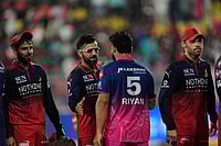 RR Vs RCB, IPL 2026: Sooryavanshi Stars As Royals Win By Six Wickets Photo: AP/Anupam Nath : Royal Challengers Bengaluru's Virat Kohli and Rajasthan Royals' captain Riyan Parag shake hands at the end of the Indian Premier League cricket match between Royal Challengers Bengaluru and Rajasthan Royals in Guwahati, India.