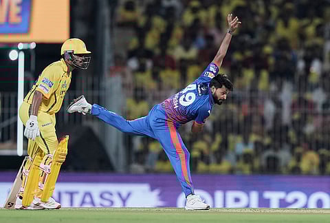 Delhi Capitals' Mukesh Kumar bowls a delivery during the Indian Premier League cricket match between Chennai Super Kings and Delhi Capitals in Chennai.
