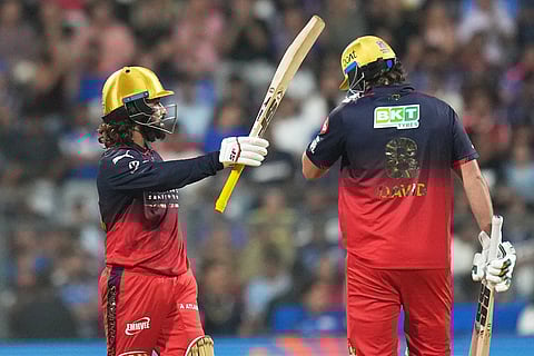 Royal Challengers Bengaluru's captain Rajat Patidar celebrates his fifty runs during the Indian Premier League cricket match between Mumbai Indians and Royal Challengers Bengaluru, in Mumbai , India.