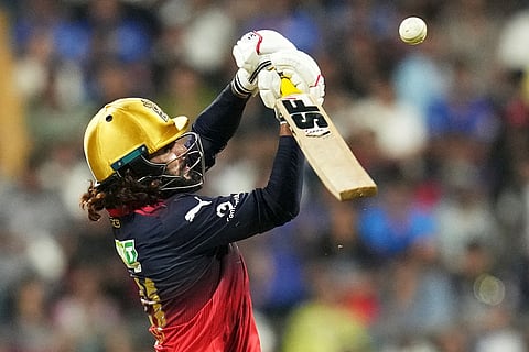 Royal Challengers Bengaluru's captain Rajat Patidar plays a shot during the Indian Premier League cricket match between Mumbai Indians and Royal Challengers Bengaluru, in Mumbai, India.