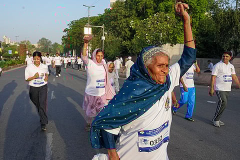 People take part in the ‘Run for Ambedkar, Run for Constitution’ marathon organised by the AICC, at Mandi House, in New Delhi.