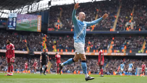| Photo: AP/Jon Super : Manchester City's Erling Haaland celebrates after scoring his third goal during the FA Cup quarter-final soccer match between Manchester City and Liverpool in Manchester, England, Saturday, April 4, 2026.