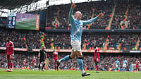 | Photo: AP/Jon Super : Manchester City's Erling Haaland celebrates after scoring his third goal during the FA Cup quarter-final soccer match between Manchester City and Liverpool in Manchester, England, Saturday, April 4, 2026. 