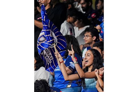 Mahieka Sharma, girlfriend of Mumbai Indians' captain Hardik Pandya, cheer in the stands, as seen on the bottom right corner, during an Indian Premier League (IPL) 2026 T20 cricket match between Mumbai Indians and Royal Challengers Bengaluru, in Mumbai, Maharashtra.