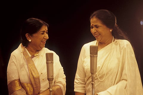 Sisters Lata Mangeshkar with Asha Bhosle seen together. Collectively, the sisters have sung over 40,000 songs in several langauges.
