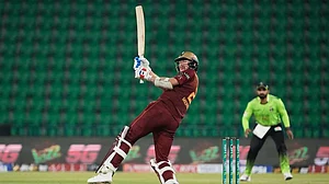 | Photo: AP/K.M. Chaudary : Hyderabad Kingsmen Riley Meredith bats during the opening cricket match of the Pakistan Super League between Lahore Qalandars and Hyderabad Kingsmen, which taking place without spectators, in Lahore, Pakistan.