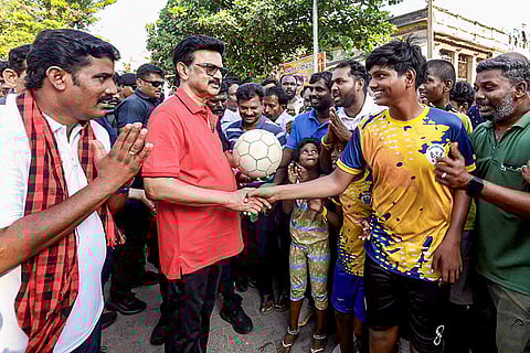  In this image posted on April 12, 2026, Tamil Nadu Chief Minister MK Stalin interacts with people during an early morning outreach campaign ahead of the state Assembly elections, in Ramanathapuram, Tamil Nadu.