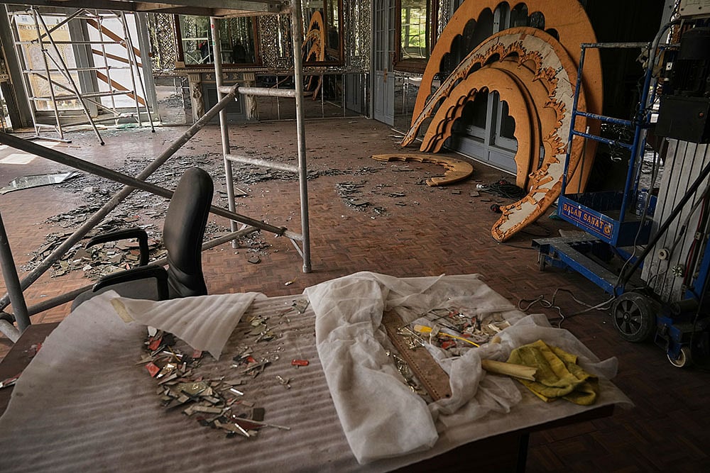 Debris lies scattered in a room damaged by, according to Iranian authorities, a nearby airstrike during U.S.-Israeli strikes in early March at the Golestan Palace, a UNESCO World Heritage site, in Tehran, Iran.