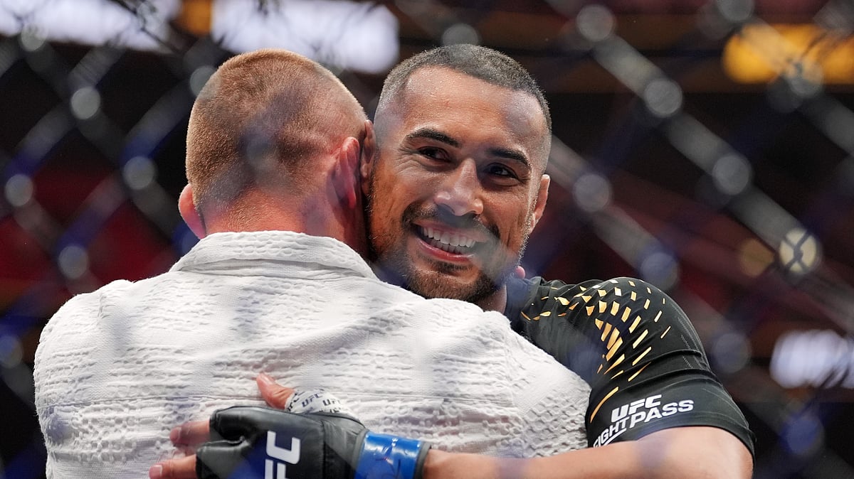 Carlos Ulberg, of New Zealand, reacts after defeating Jiri Prochazka, of Czechia, by TKO to win their light heavyweight title bout at a UFC 327 mixed martial arts event, Saturday, April 11, 2026, in Miami.  - (AP Photo/Rebecca Blackwell)