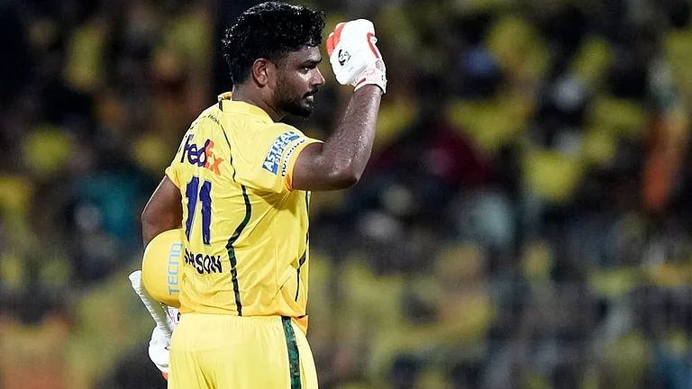 Chennai Super Kings' Sanju Samson celebrates his century during the Indian Premier League cricket match between Chennai Super Kings and Delhi Capitals in Chennai. - | Photo: AP/Mahesh Kumar A.