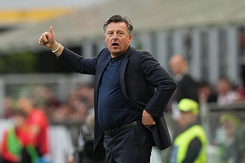 Udinese's head coach Kosta Runjaic reacts during the Serie A soccer match between AC Milan and Udinese, in Milan, Italy.