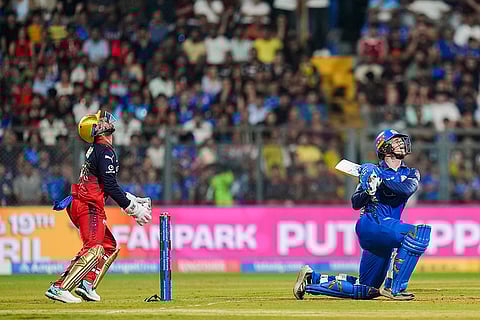Mumbai Indians' Ryan Rickelton plays a shot during an Indian Premier League (IPL) 2026 T20 cricket match between Mumbai Indians and Royal Challengers Bengaluru, in Mumbai, Maharashtra.