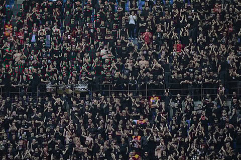AC Milan supporters ceer during the Serie A soccer match between AC Milan and Udinese, in Milan, Italy.