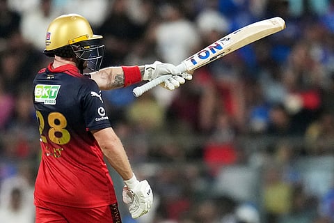 Royal Challengers Bengaluru's Phil Salt celebrates his fifty runs during the Indian Premier League cricket match between Mumbai Indians and Royal Challengers Bengaluru, in Mumbai , India.