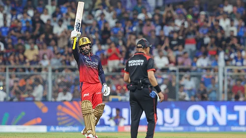 IPL/X : Rajat Patidar celebrating his half-century during MI vs RCB IPL 2026 match at Wankhede Stadium in Mumbai.