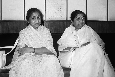 Indian Bollywood playback singer-duo Asha Bhosle and Lata Mangeshkar