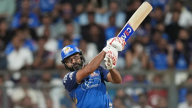 Mumbai Indians' Rohit Sharma plays a shot during the Indian Premier League cricket match between Mumbai Indians and Kolkata Knight Riders in Mumbai, India, Sunday, March 29, 2026. - AP Photo/Rafiq Maqbool