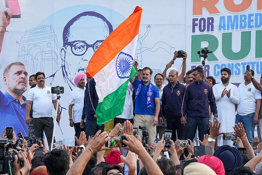 Congress MP and Lok Sabha LoP Rahul Gandhi flags off the ‘Run for Ambedkar, Run for Constitution’ marathon organised by the AICC, at Mandi House, in New Delhi. - | Photo: PTI/Arun Sharma