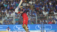 IPL/X : Phil Salt in action for RCB against MI in IPL 2026 clash at Wankhede Stadium in Mumbai. 