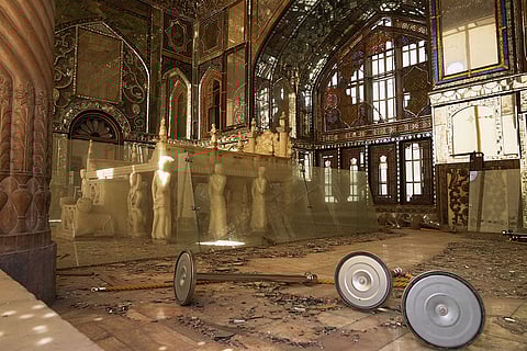 Broken glass lies on the floor in a room damaged, according to Iranian authorities, by a nearby airstrike during U.S.-Israeli strikes in early March at the Golestan Palace, a UNESCO World Heritage site, in Tehran, Iran.