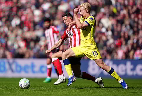 Sunderland's Granit Xhaka, left, and Tottenham Hotspur's Lucas Bergvall battle for the ball during the Premier League soccer match between Sunderland and Tottenham Hotspur, in Sunderland, England.