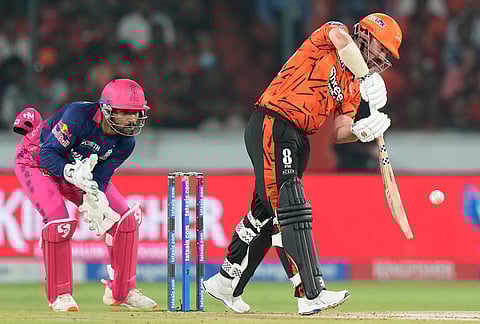 Sunrisers Hyderabad's Travis Head plays a shot during the Indian Premier League cricket match between Sunrisers Hyderabad and Rajasthan Royals in Hyderabad.
