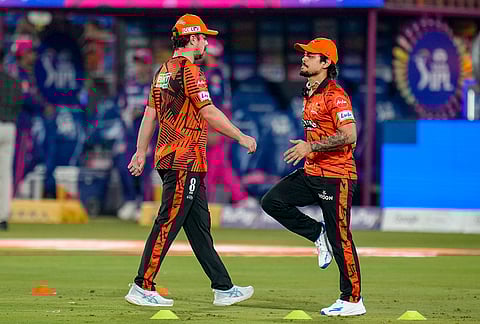 Sunrisers Hyderabad's captain Ishan Kishan, right, during warm-up ahead of the Indian Premier League (IPL) 2026 T20 cricket match between Sunrisers Hyderabad and Rajasthan Royals, at Rajiv Gandhi International Stadium in Hyderabad, Telangana.