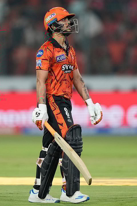 Sunrisers Hyderabad's captain Ishan Kishan, leaves the ground after losing his wicket during the Indian Premier League cricket match between Sunrisers Hyderabad and Rajasthan Royals in Hyderabad.