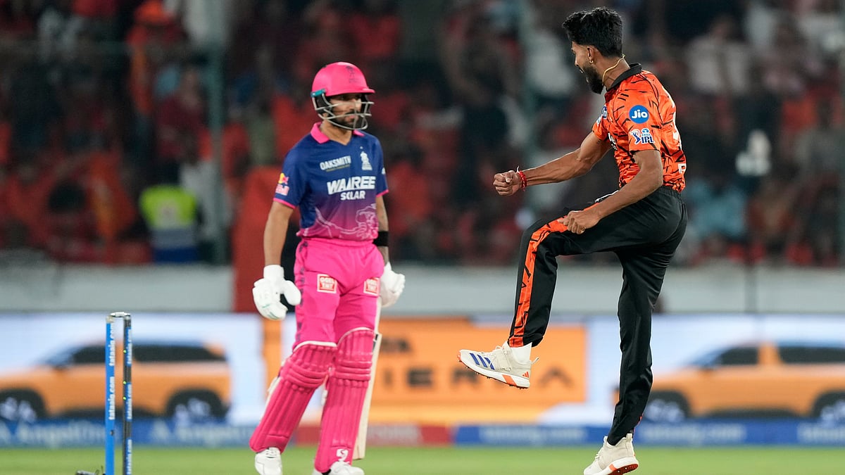 Praful Hinge celebrates his wicket by dismissing Dhruv Jurel during SRH vs RR IPL 2026 match.  - AP Photo