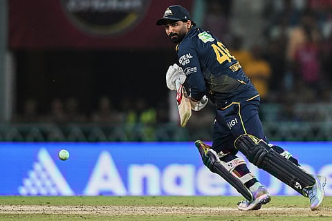 Gujarat Titans' Rahul Tewatia plays a shot during the Indian Premier League cricket match between Gujarat Titans and Lucknow Super Giants in Lucknow, India.