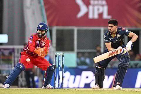 Gujarat Titans' captain Shubman Gill plays a shot during the Indian Premier League cricket match between Gujarat Titans and Lucknow Super Giants in Lucknow, India.