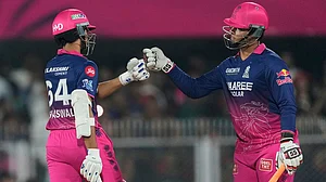 | Photo: AP/Anupam Nath : Rajasthan Royals' Vaibhav Sooryavanshi, right and Rajasthan Royals' Yashasvi Jaiswal toss during the Indian Premier League cricket match between Royal Challengers Bengaluru and Rajasthan Royals in Guwahati, India.