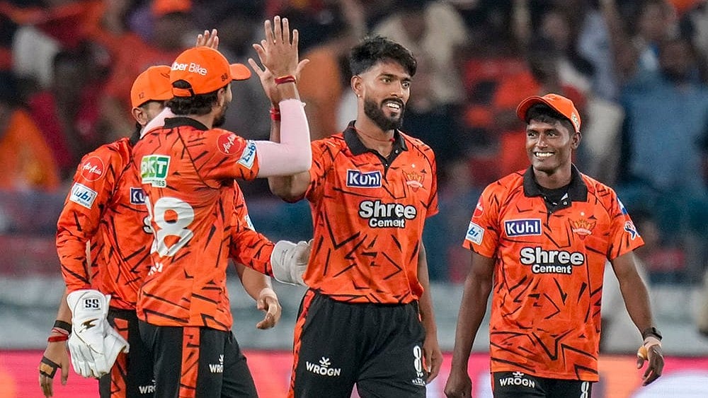 Sunrisers Hyderabad's Praful Hinge, second right, with teammates celebrates after the wicket of Rajasthan Royals' Vaibhav Sooryavanshi during the Indian Premier League (IPL) 2026 T20 cricket match between Sunrisers Hyderabad and Rajasthan Royals, at Rajiv Gandhi International Stadium in Hyderabad, Telangana. - | Photo: PTI/Shahbaz Khan