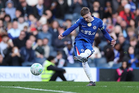Chelsea's Cole Palmer shoots during the Premier League soccer match between Chelsea and Manchester City in London.