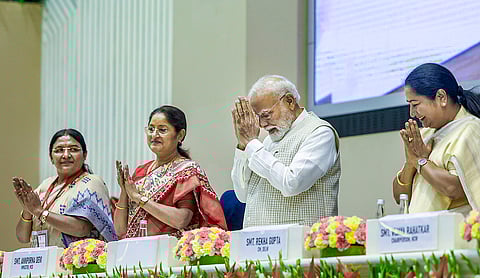 Prime Minister Narendra Modi during the 'Nari Shakti Vandan Sammelan', in New Delhi. Delhi Chief Minister Rekha Gupta, Union Minister Annpurna Devi and others are also seen. 