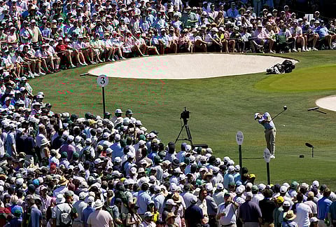 Rory McIlroy, of Northern Ireland, hits his tee shot on the third hole during the final round of the Masters golf tournament at the Augusta National Golf Club in Augusta, Georgia. 
