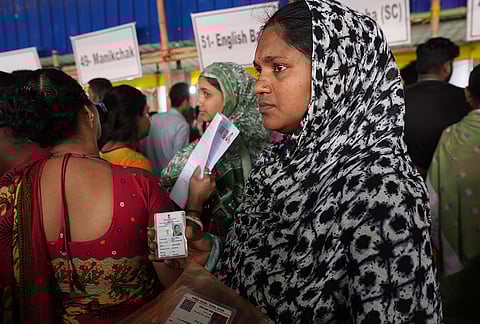 People wait to submit petitions before the Special Tribunal after their names were deleted from the Special Intensive Revision final voter list ahead of the West Bengal Assembly elections in Malda
