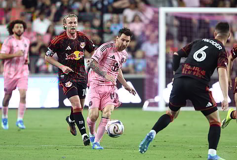 Inter Miami forward Lionel Messi (10) sends a pass forward in the first half of an MLS soccer match in Miami. 