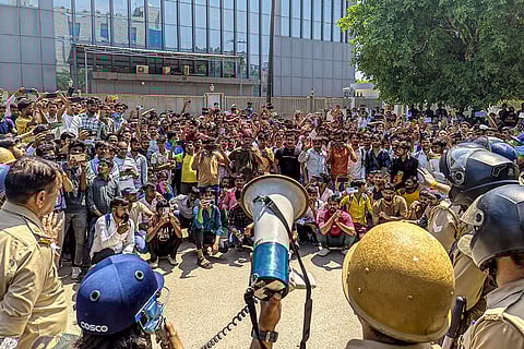 Factory workers during a protest demanding a hike in wages, in Noida, Gautam Buddh Nagar district, Uttar Pradesh. The protest carried incidents of arson, vandalism and stone-pelting reported from Phase-2 and Sector 60 areas, police said.