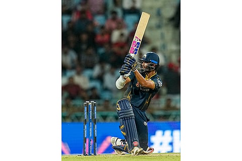 Gujarat Titans' Washington Sundar plays a shot during the Indian Premier League (IPL) 2026 cricket match between Lucknow Super Giants and Gujarat Titans, at Ekana Stadium in Lucknow.