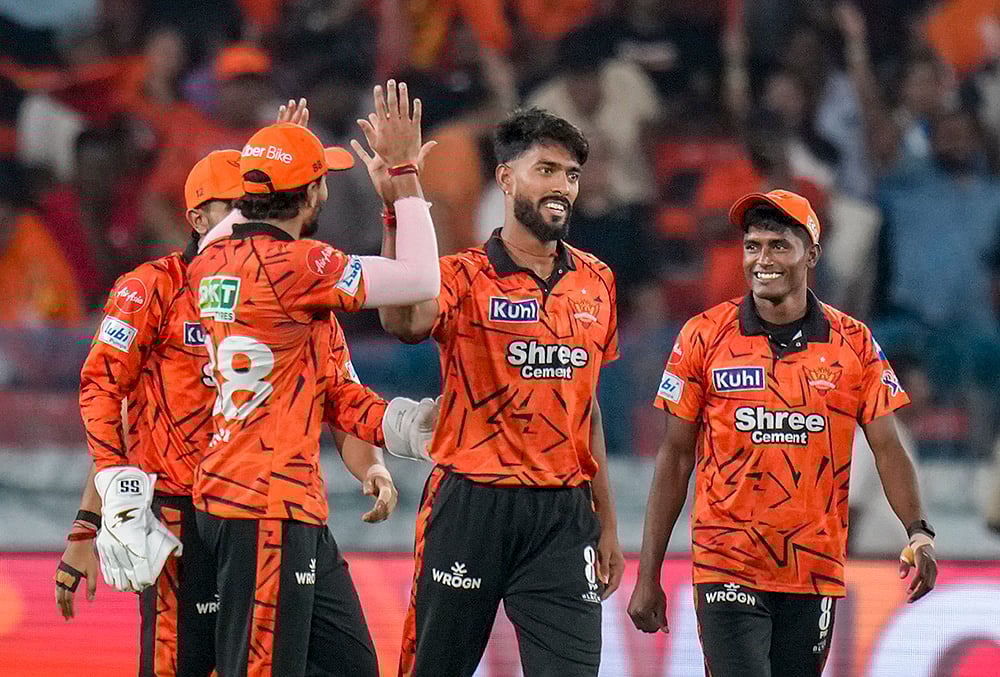 Sunrisers Hyderabad's Praful Hinge, second right, with teammates celebrates after the wicket of Rajasthan Royals' Vaibhav Sooryavanshi during the Indian Premier League (IPL) 2026 T20 cricket match between Sunrisers Hyderabad and Rajasthan Royals, at Rajiv Gandhi International Stadium in Hyderabad, Telangana. - | Photo: PTI/Shahbaz Khan