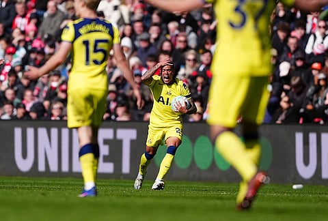 Tottenham Hotspur's Pedro Porro, centre, reacts to a decision during the Premier League soccer match between Sunderland and Tottenham Hotspur, in Sunderland, England.