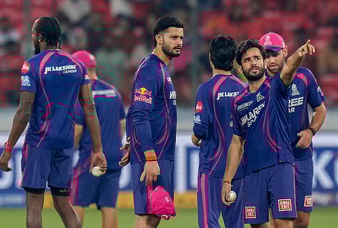 Rajasthan Royals' Yudhvir Singh Charak, centre, Ravi Bishnoi and other players during warm-up ahead of the Indian Premier League (IPL) 2026 T20 cricket match between Sunrisers Hyderabad and Rajasthan Royals, at Rajiv Gandhi International Stadium in Hyderabad, Telangana.