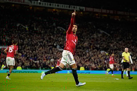 Manchester United's Casemiro celebrates after scoring during the Premiier League soccer match between Manchester United and Leeds in Manchester, England.