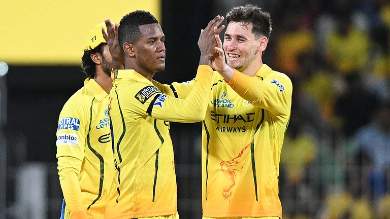Chennai Super Kings' Akeal Hosein, centre, celebrates with teammates the wicket of Kolkata Knight Riders' Angkrish Raghuvanshi during their Indian Premier League match in Chennai. - AP