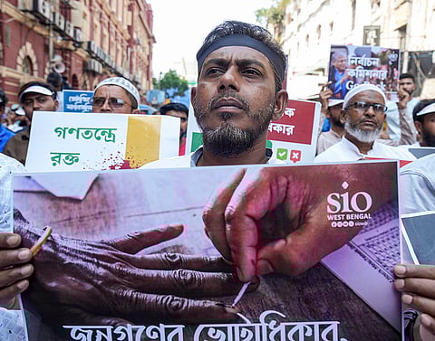 Members of Votadhikar Raksha Mancha stage a protest demanding voting rights for deleted voters ahead of the West Bengal Assembly elections, in Kolkata.