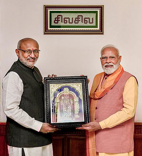 Vice-President CP Radhakrishnan presents a memento to Prime Minister Narendra Modi during the PM’s visit to the Vice President's Enclave on the occasion of ‘Puthandu’ (Tamil New Year), in New Delhi. 