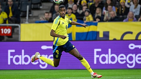 Sweden's Alexander Isak looks at the ball during an international friendly soccer match between Sweden and Northern Ireland at Strawberry Arena in Stockholm, Sweden, Tuesday March 25, 2025. 