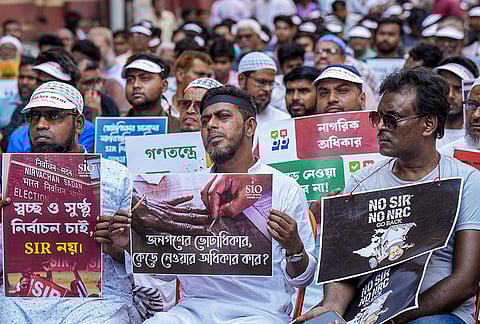 Members of Votadhikar Raksha Mancha stage a protest demanding voting rights for deleted voters ahead of the West Bengal Assembly elections, in Kolkata.